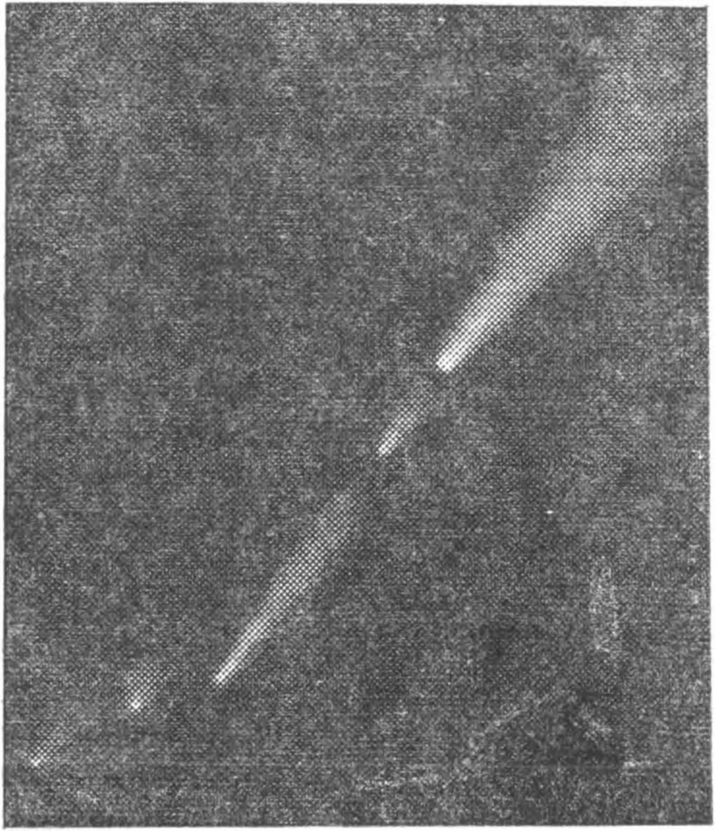 Рис. 84. Комета Брукса (1889 V) с четырьмя спутниками